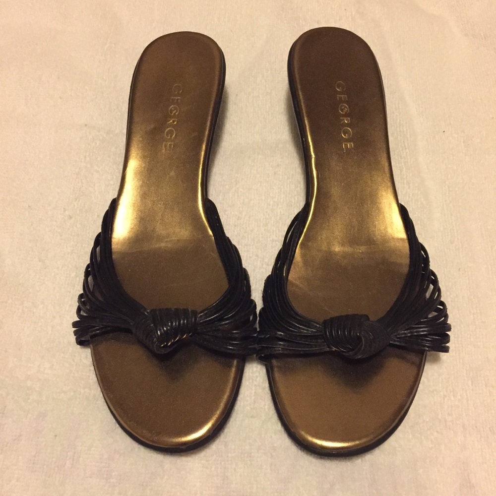 Black and gold sandals with kitten heels